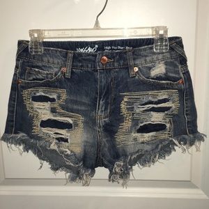 Distressed blue jean shorts